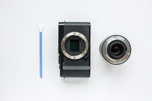 professional tools for digital APS-C dirty camera matrix sensor cleaning on white background photo