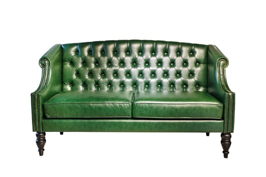 dark green leather sofa in chester style for elite loft interior isolated white background photo