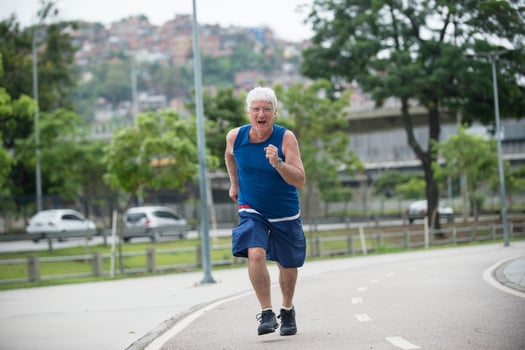 Senior runner on street photo