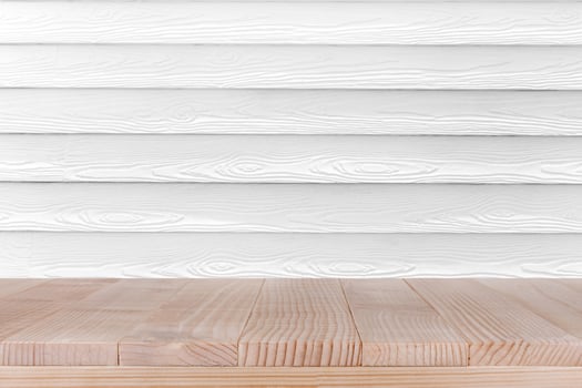 Wood table top on white wood background- can be used for montage or display your products photo