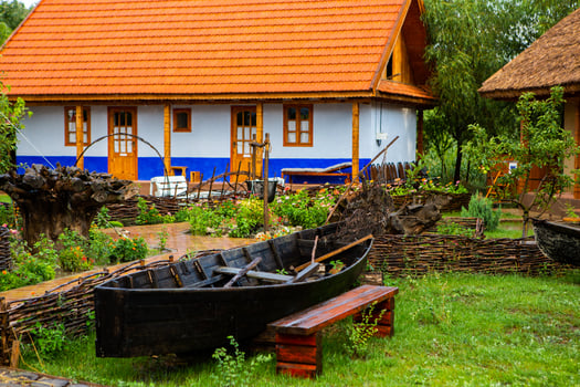rural house made of clay and clay roof. The ideal country house for rest and relaxation in the bosom of nature photo