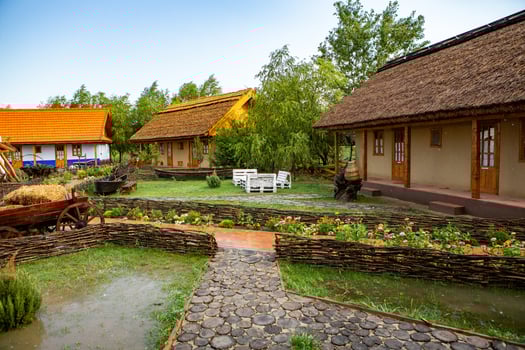 rural house made of clay and clay roof. The ideal country house for rest and relaxation in the bosom of nature photo