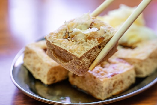 Deep fried stinky tofu with pickled cabbage, famous and delicious street food in Taiwan. photo