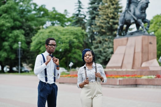 Stylish african american business couple posed outdoor. photo
