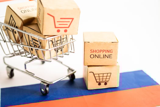 Box with shopping online cart logo and Russia flag, Import Export Shopping online or commerce finance delivery service store product shipping, trade, supplier concept. photo