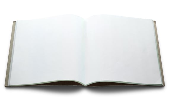 blank open book isolated on white background photo