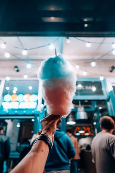 hand holding cotton candy photo