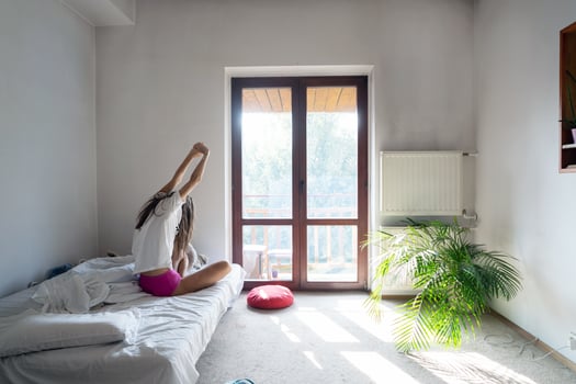 Women wake up from sleep. are stretch herself in the morning photo