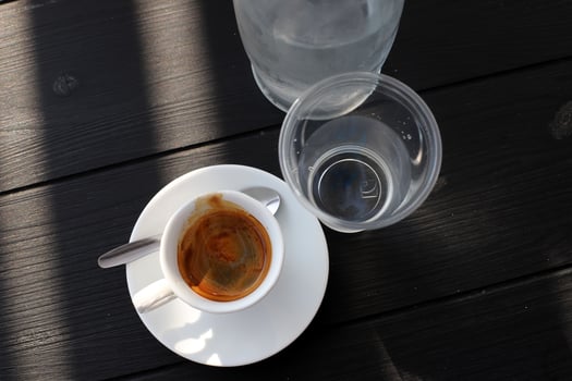 On the table in the restaurant strong and hot coffee. photo