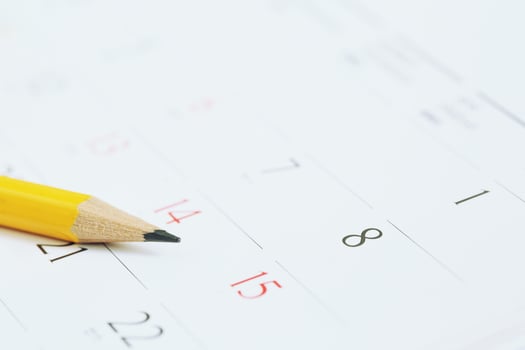 Calendar page number. pencil yellow to mark the desired date to remind memory. timeline organize schedule,appointment and meeting reminder. planning for business or travel holiday planning concept. photo