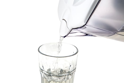 Water jug with glass photo