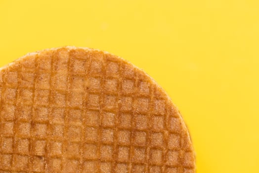 Stroopwafel On Yellow Background photo