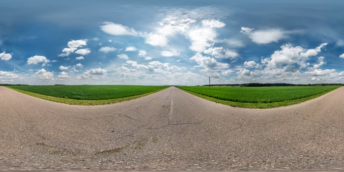 full seamless spherical hdri panorama 360 degrees angle view on asphalt road among fields in summer day with awesome clouds in equirectangular projection, ready for VR AR virtual reality content photo