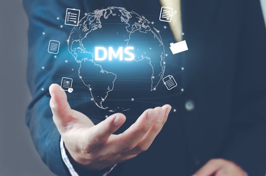 Businessman hand world virtual screen DMS document management system digital technology connection icon concept. photo