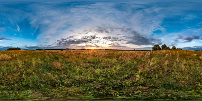 full seamless spherical hdri panorama 360 degrees angle view among fields in summer evening sunset with beautiful clouds in equirectangular projection. ready for VR AR content photo