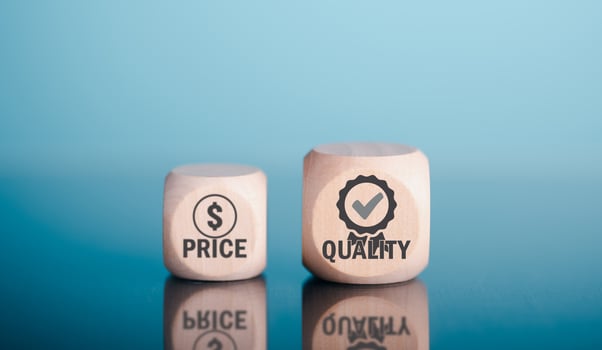 wooden cube is placed on the table displaying a message of quality assurance.best quality business idea, management and improvement of excellent products and services. to develop industry standards photo