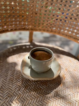 Hot coffee cup on table photo