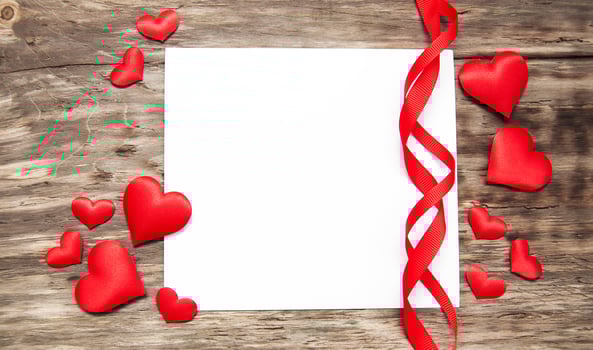 Greeting card with red hearts photo