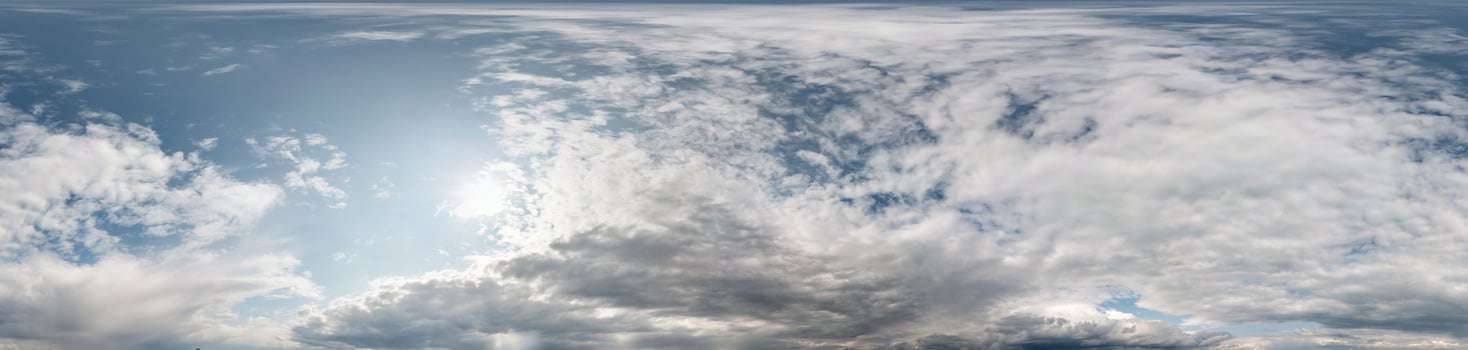 Seamless cloudy blue sky hdri panorama 360 degrees angle view with zenith and beautiful clouds for use in 3d graphics as sky dome photo