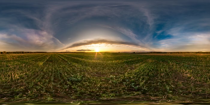 full seamless spherical hdri panorama 360 degrees angle view among fields in summer evening sunset with awesome blue pink red clouds in equirectangular projection, ready for VR AR virtual reality photo