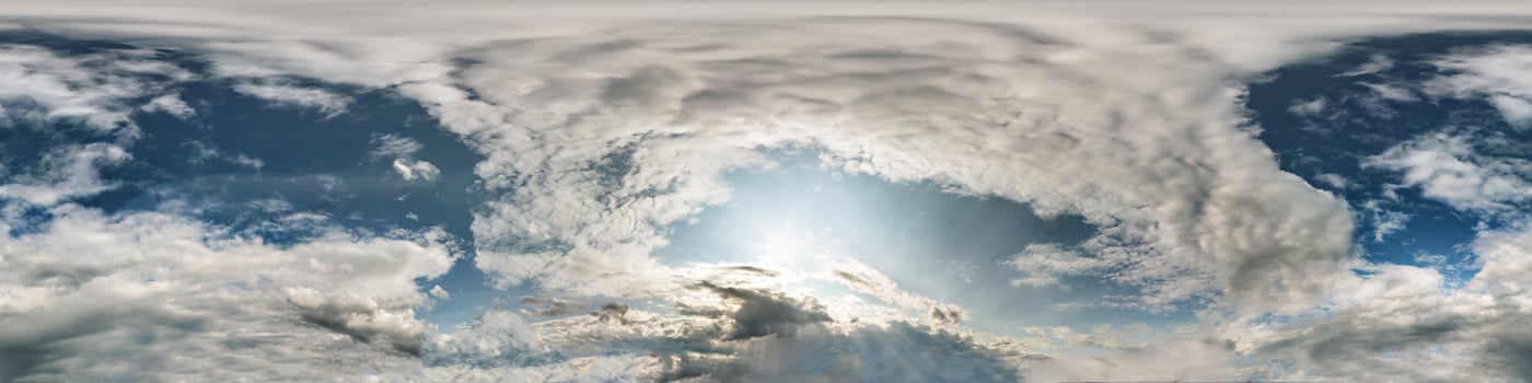 Seamless cloudy blue sky hdri panorama 360 degrees angle view with zenith and beautiful clouds for use in 3d graphics as sky dome or edit drone shot photo