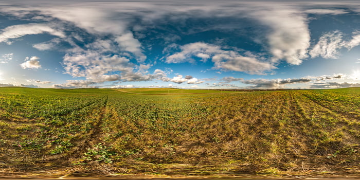 full seamless spherical hdri panorama 360 degrees angle view among fields in autumn sunny day with awesome clouds in equirectangular projection with zenith and nadir, ready for VR AR virtual reality photo