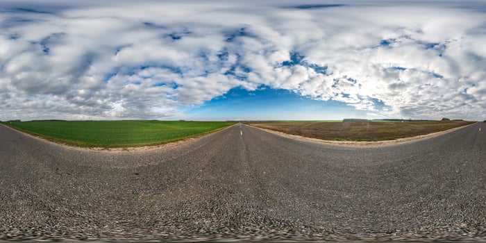 full seamless spherical hdri panorama 360 degrees angle view on asphalt road among fields in autumn day with beautiful clouds in equirectangular projection, ready for VR AR virtual reality content photo