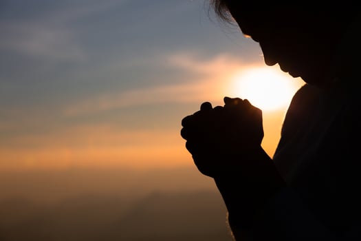 Religious young woman praying to God in the morning, spirtuality and religion, Religious concepts photo