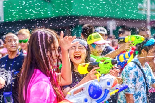 Siam Square, Bangkok, Thailand - APR 13, 2019 short action of people joins celebrations of the Thai New Year or Songkran in Siam Square. photo