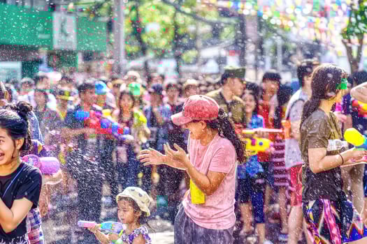Siam Square, Bangkok, Thailand - APR 13, 2019 short action of people joins celebrations of the Thai New Year or Songkran in Siam Square. photo