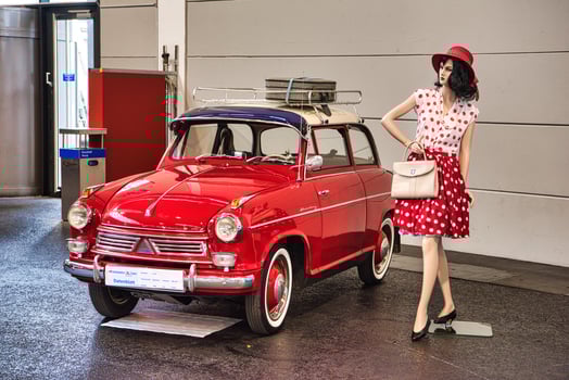 FRIEDRICHSHAFEN - MAY 2019 red LLOYD ALEXANDER 1958 and woman mannequin at Motorworld Classics Bodensee on May 11, 2019 in Friedrichshafen, Germany photo