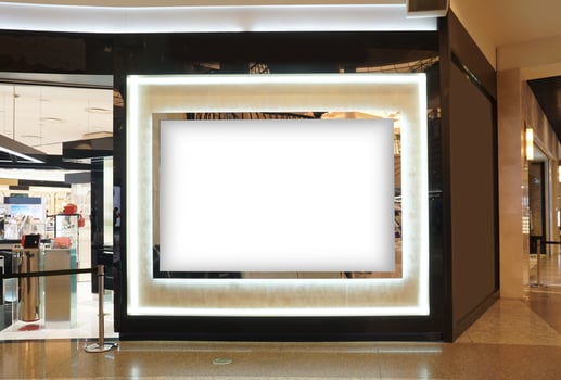 Advertising poster board inside department store photo