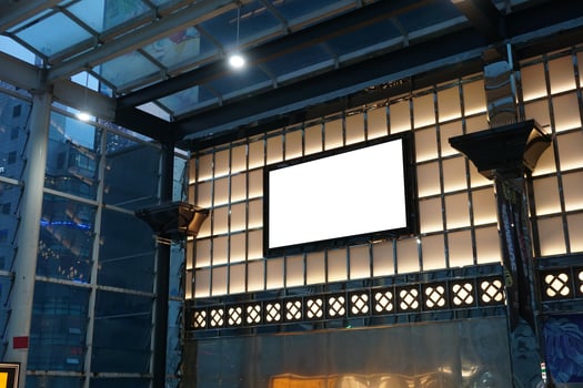 Advertising poster board inside department store photo