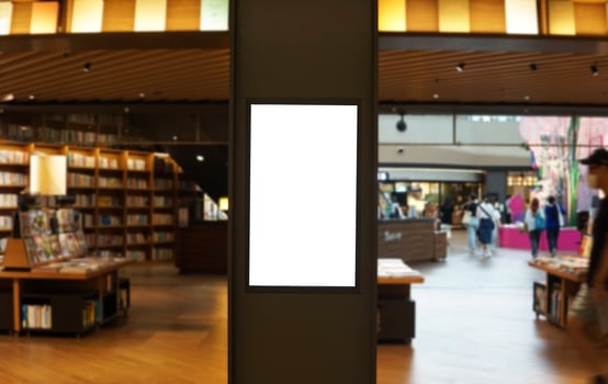 Advertising poster board inside department store photo