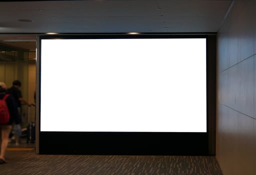 an advertisement inside the airport photo