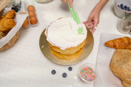 Close up of Young beautiful woman is baking in her kitchen , bakery and coffee shop business photo