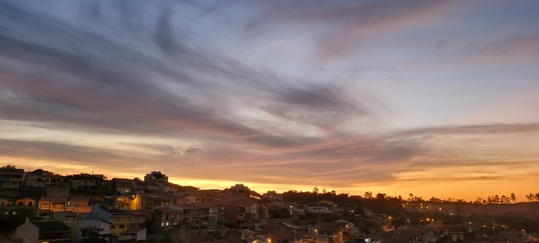 colorful late afternoon sunset in the countryside of Brazil photo