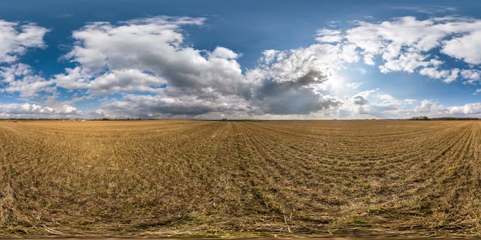 full seamless spherical hdri panorama 360 degrees angle view on among fields in spring day with awesome clouds in equirectangular projection, ready for VR AR virtual reality content photo