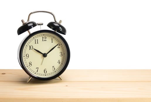 retro alarm clock on white background photo