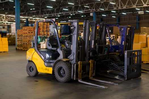 Forklift loader in warehouse, machinery and Logistics concept. photo