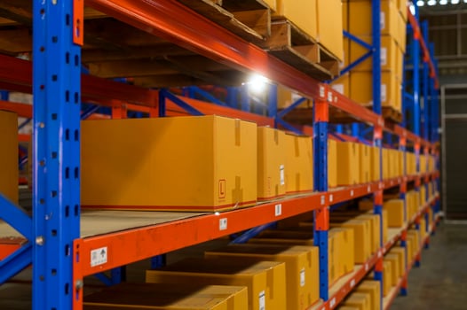 Inventory full of shelves in modern warehouse storage of retail shop. photo