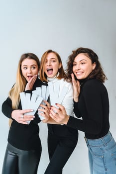 Three beautiful young girls posing for the camera photo