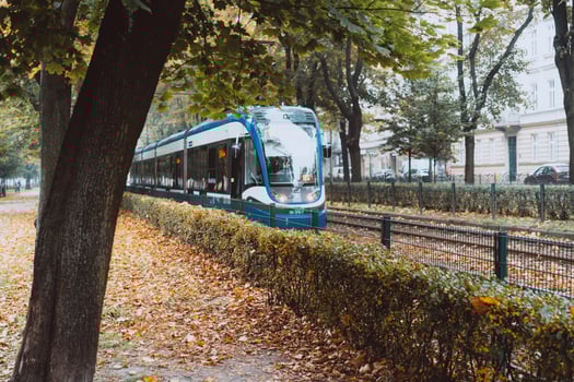Blue city trams in the autumn city. photo