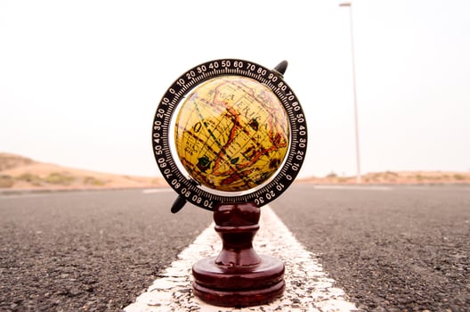 Globe on the road photo