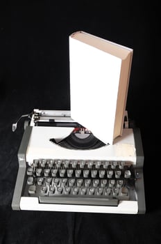 Typewriter on black background photo