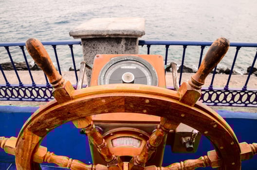 Ship helm close-up photo