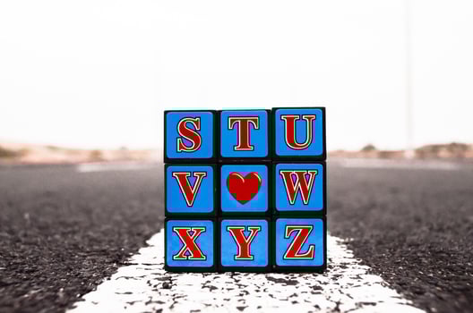 Variation of a Rubik cube on the road photo