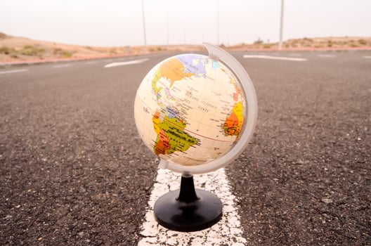 Globe on the road photo