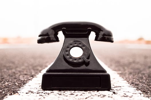 Vintage phone on the road photo