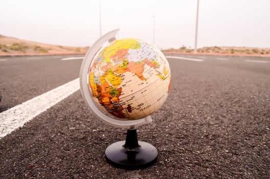 Globe on the road photo